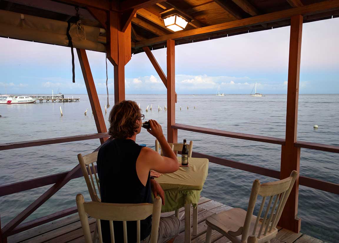 Picture of Tony having beer on dock.